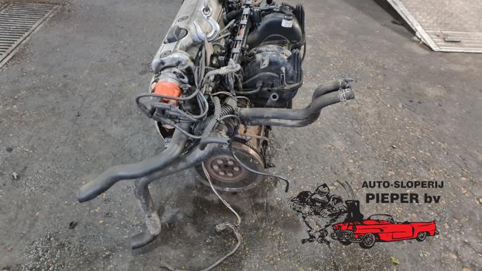 Engine from a Volkswagen Polo III (6N1) 1.6i 75 1998