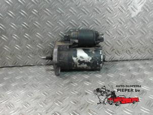 Anlasser van een Volkswagen Polo III (6N1) 1.6i 75 1998