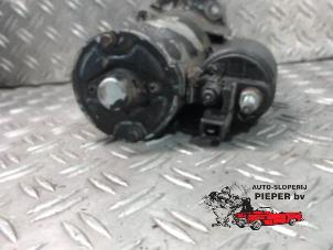 Anlasser van een Volkswagen Polo III (6N1) 1.6i 75 1998