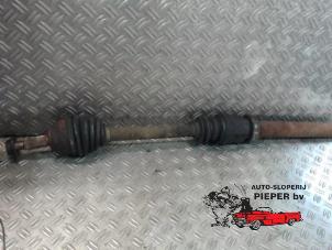 Used Front drive shaft, left Ford Focus 1 1.8 16V Price on request offered by Autosloperij Pieper BV