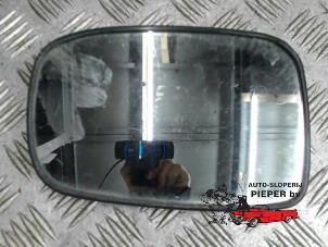 Used Mirror glass, left Suzuki Liana (ERC/ERD/RH4) 1.6 MPi 16V Price € 15,75 Margin scheme offered by Autosloperij Pieper BV