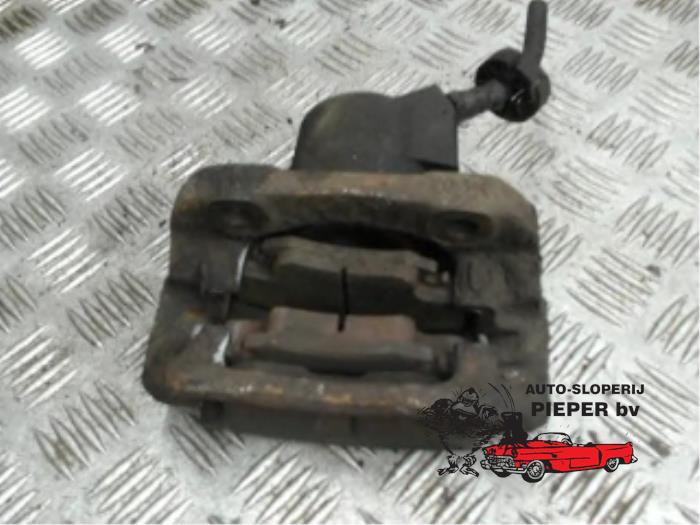 Front brake calliper, right from a Renault Clio (B/C57/357/557/577) 1.4 Kat. 1997