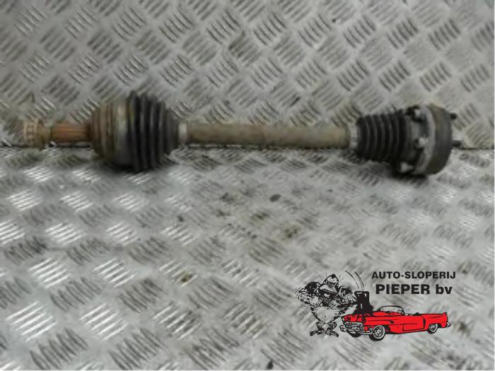 Front drive shaft, left from a Volkswagen Lupo (6X1)  1999