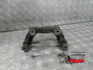 Used Rear brake calliperholder, right Ford Mondeo III Wagon 1.8 16V Price on request offered by Autosloperij Pieper BV