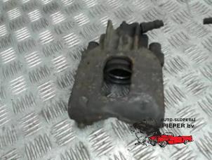 Used Front brake calliper, left Ford Focus 1 Wagon 1.6 16V Price € 36,75 Margin scheme offered by Autosloperij Pieper BV