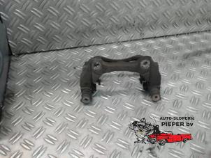 Used Front brake calliperholder, right Opel Corsa D 1.3 CDTi 16V ecoFLEX Price on request offered by Autosloperij Pieper BV