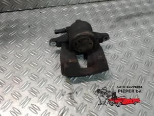 Used Front brake calliper, left Opel Corsa D 1.3 CDTi 16V ecoFLEX Price on request offered by Autosloperij Pieper BV