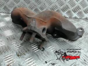 Used Exhaust manifold Volkswagen Polo III (6N1) 1.4i 60 Price € 42,00 Margin scheme offered by Autosloperij Pieper BV
