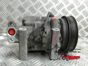 Used Air conditioning pump Nissan Micra (K11) 1.0 L,LX 16V Price on request offered by Autosloperij Pieper BV