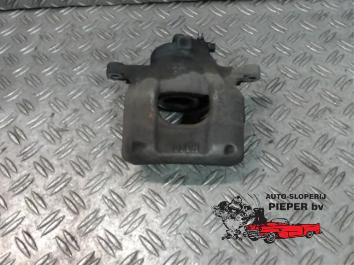 Front brake calliper, left from a Toyota Aygo (B40) 1.0 12V VVT-i 2015