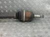 Front drive shaft, left from a Ford Focus 2 Wagon 2.0 TDCi 16V 2005