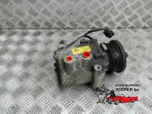 Used Air conditioning pump Ford Fiesta 5 (JD/JH) 1.3 Price on request offered by Autosloperij Pieper BV