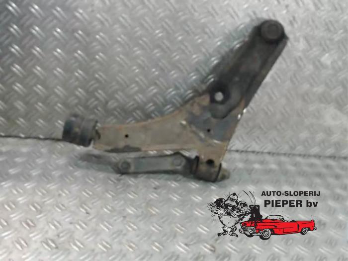 Front wishbone, right from a Suzuki Swift (SF310/413) 1.0i 5-Drs. 1999