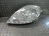 Headlight, left from a Renault Trafic New (FL) 2.0 dCi 16V 90 2009