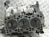 Cylinder head from a Volkswagen Polo IV (9N1/2/3) 1.4 TDI 80 2007