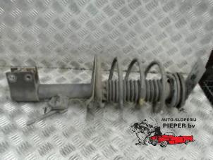 Used Front shock absorber rod, left Citroen C4 Coupé (LA) 1.4 16V Price on request offered by Autosloperij Pieper BV