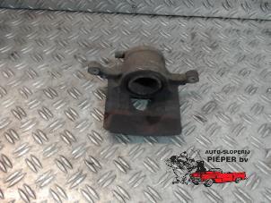 Used Front brake calliper, left Chevrolet Spark 1.0 16V Bifuel Price on request offered by Autosloperij Pieper BV