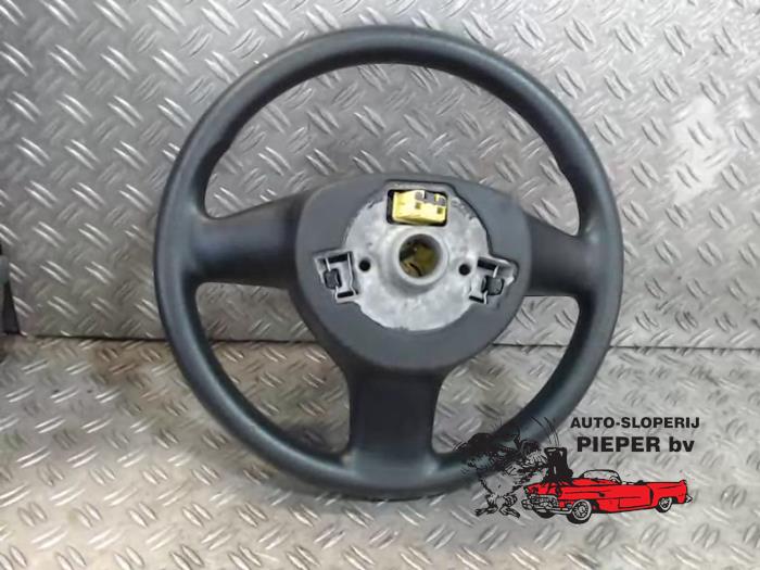 Steering wheel from a Volkswagen Polo IV (9N1/2/3) 1.4 TDI 80 2007
