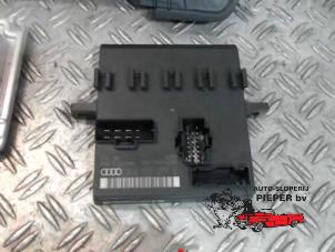 Engine management computer from a Audi A4 Avant (B6) 2.5 TDI 24V 2003