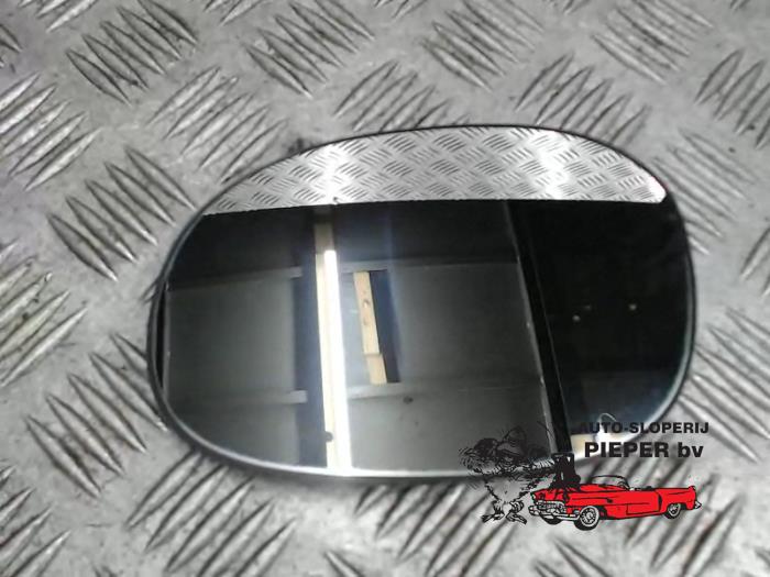 Mirror glass, left from a Peugeot 206 (2A/C/H/J/S) 1.4 XR,XS,XT,Gentry 2000
