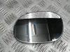 Mirror glass, left from a Peugeot 206 (2A/C/H/J/S) 1.4 XR,XS,XT,Gentry 2000