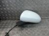 Wing mirror, left from a Opel Corsa D 1.4 16V Twinport 2009