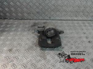 Used Front brake calliper, left Opel Corsa D 1.4 16V Twinport Price on request offered by Autosloperij Pieper BV