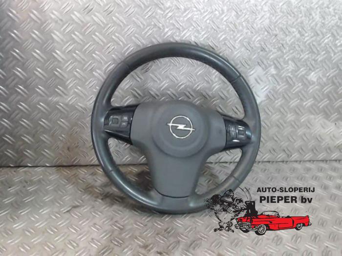 Steering wheel from a Opel Corsa D 1.4 16V Twinport 2009
