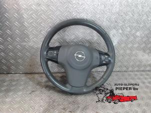 Used Steering wheel Opel Corsa D 1.4 16V Twinport Price on request offered by Autosloperij Pieper BV