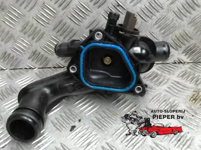 Thermostat housing from a MINI Mini (R56) 1.4 16V One 2008