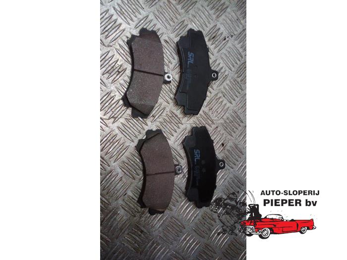 Front brake pad from a Volvo V40 (VW)  1998
