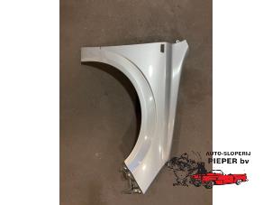 Used Front wing, right Opel Astra Price on request offered by Autosloperij Pieper BV