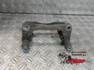 Used Front brake calliperholder, left Opel Agila (B) 1.2 16V Price on request offered by Autosloperij Pieper BV
