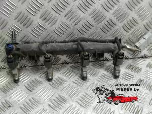 Used Fuel injector nozzle Peugeot 206 (2A/C/H/J/S) 1.4 16V Price on request offered by Autosloperij Pieper BV
