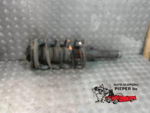 Used Front shock absorber rod, left Peugeot 306 (7A/C/S) 1.4 Price on request offered by Autosloperij Pieper BV