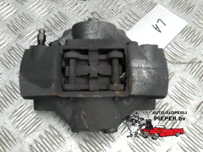 Rear brake calliper, left from a Volvo 850 Estate 2.5i 10V 1995