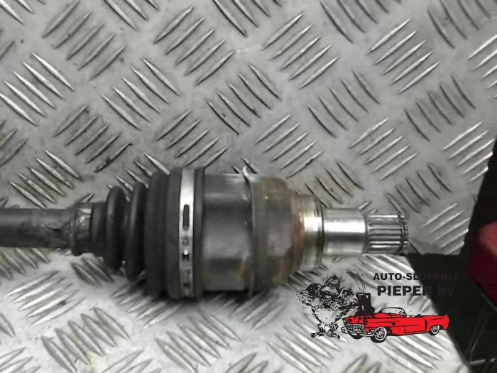 Front drive shaft, right from a Daihatsu Cuore (L251/271/276) 1.0 12V DVVT 2005