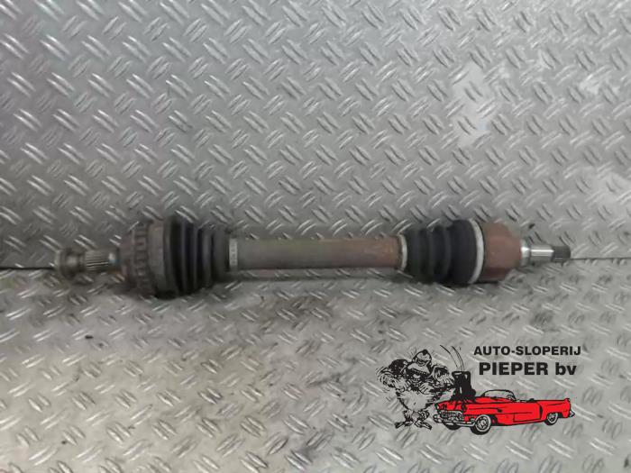 Front drive shaft, left from a Peugeot 306 (7A/C/S) 1.6i XR,XT,ST 2001