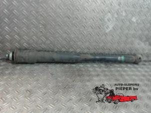 Used Rear shock absorber, left Mitsubishi Colt (Z2/Z3) 1.3 16V Price on request offered by Autosloperij Pieper BV