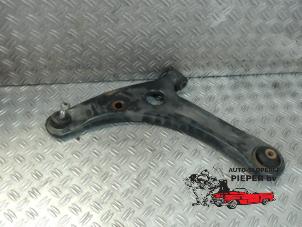 Used Front wishbone, left Mitsubishi Colt (Z2/Z3) 1.3 16V Price on request offered by Autosloperij Pieper BV