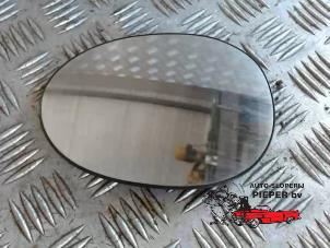 Used Mirror glass, left Peugeot 107 1.0 12V Price on request offered by Autosloperij Pieper BV