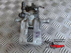 Used Rear brake calliper, right Nissan Almera (N16) 1.5 16V Price on request offered by Autosloperij Pieper BV
