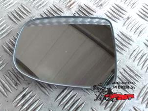 Used Mirror glass, left Daihatsu Cuore (L251/271/276) 1.0 12V DVVT Price on request offered by Autosloperij Pieper BV