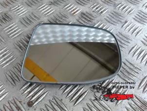 Used Mirror glass, right Daihatsu Cuore (L251/271/276) 1.0 12V DVVT Price on request offered by Autosloperij Pieper BV