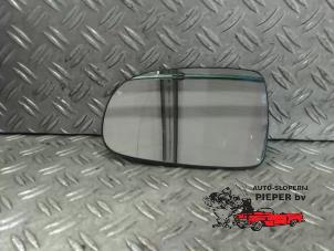 Used Mirror glass, left Opel Corsa C (F08/68) 1.2 16V Twin Port Price on request offered by Autosloperij Pieper BV
