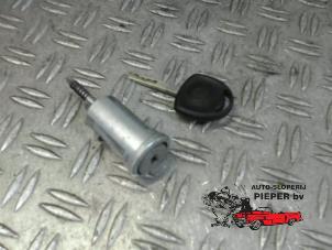 Used Ignition lock + key Opel Corsa C (F08/68) 1.2 16V Twin Port Price on request offered by Autosloperij Pieper BV