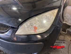 Used Headlight, left Mitsubishi Colt (Z2/Z3) 1.1 12V Price on request offered by Autosloperij Pieper BV