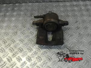Used Front brake calliper, left Opel Corsa D 1.0 Price on request offered by Autosloperij Pieper BV