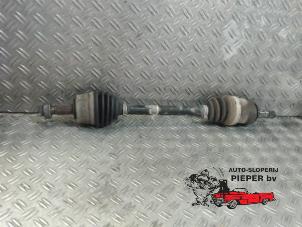 Used Front drive shaft, left Opel Corsa D 1.4 16V Twinport Price on request offered by Autosloperij Pieper BV