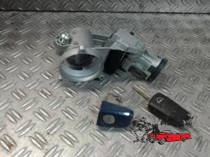 Used Ignition lock + key Opel Corsa D 1.4 16V Twinport Price on request offered by Autosloperij Pieper BV